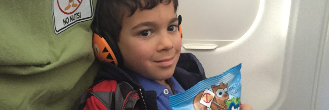 My peanut allergic son feeling happy and safe flying JetBlue Airways.