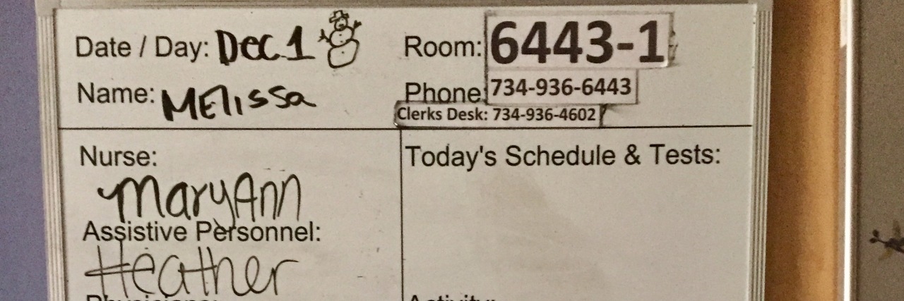 Learning Lessons From My Health Trials sign on a woman's hospital door