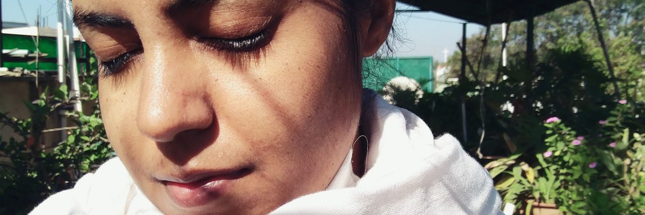 Learning to Be Gentle and Rest With Thyroid Cancer woman looking sad before treatment