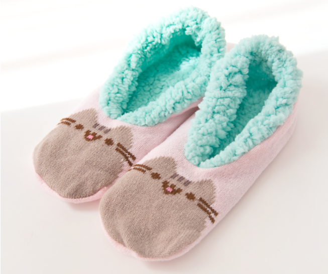 slipper socks with teal interior and pusheen cat design on top