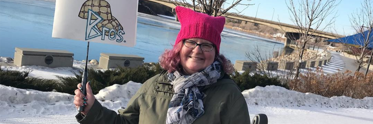 PTSD: How the Women’s March Has Changed for Me in 2 Years woman holding women's march sign