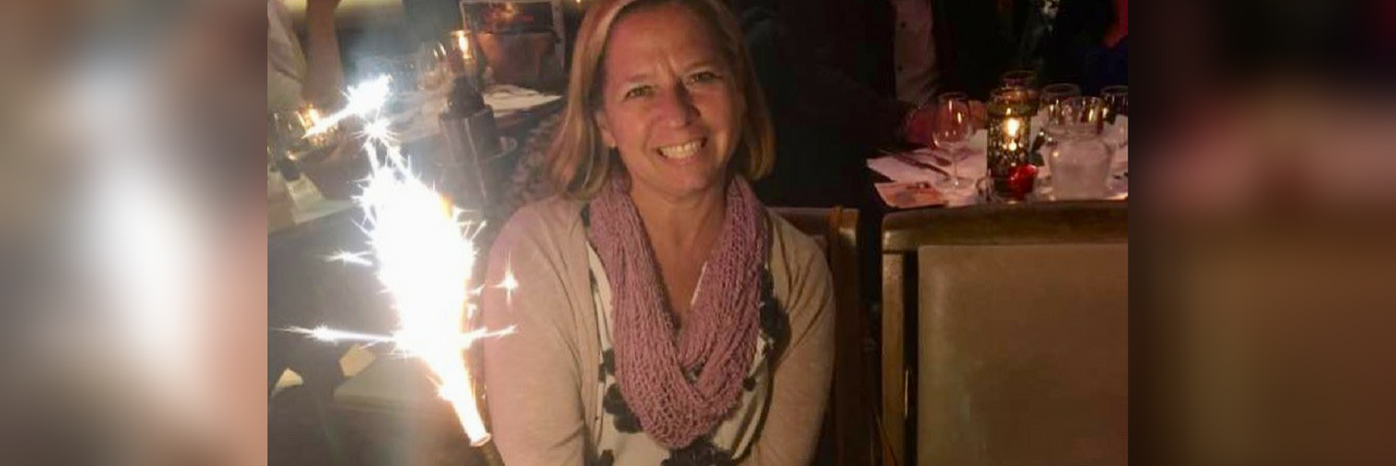 What to Know About Someone With Dietary Restrictions Due to Illness woman out to dinner in a restaurant in paris