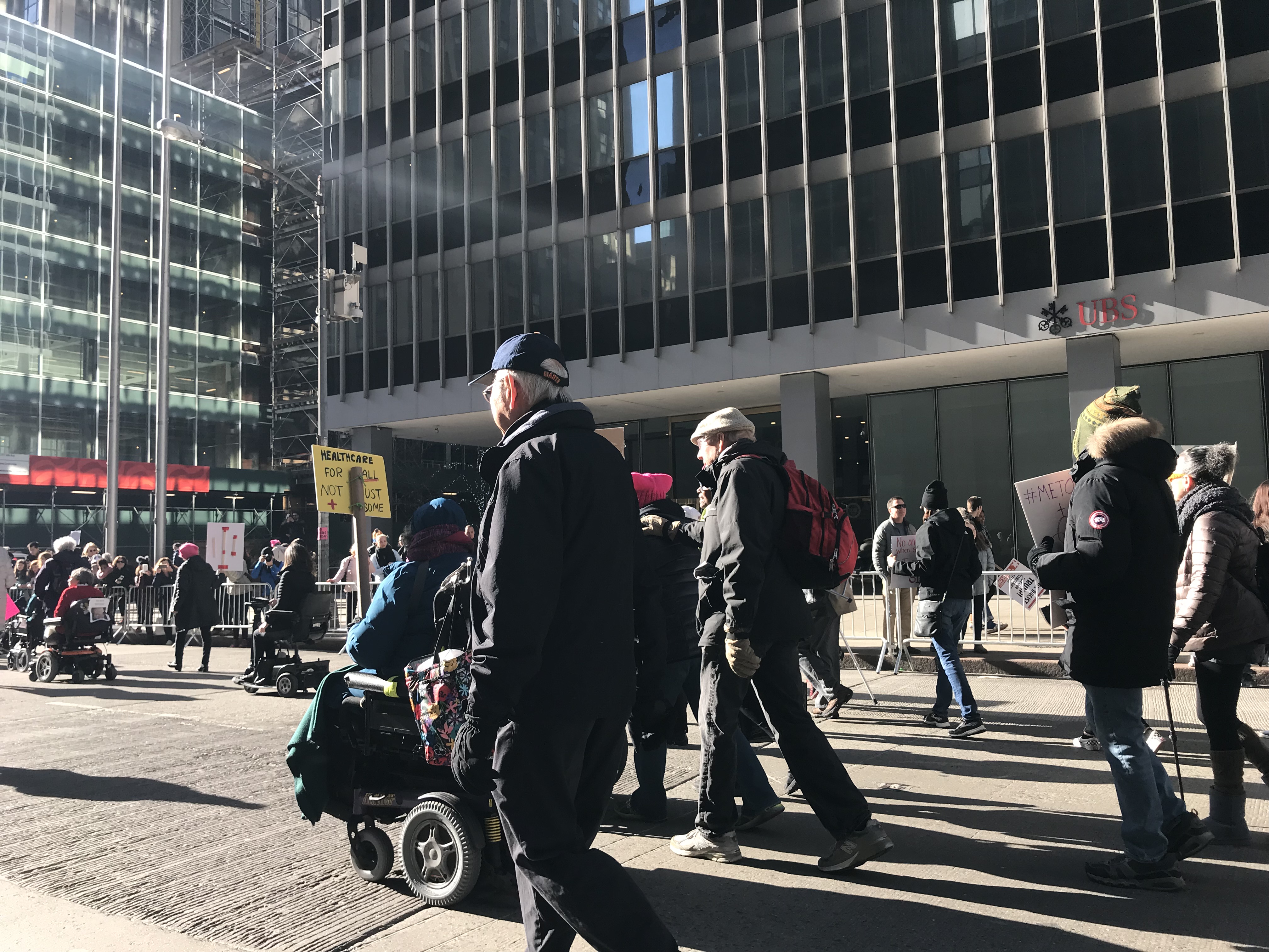 people in wheelchairs at the 2018 women's march in new york city