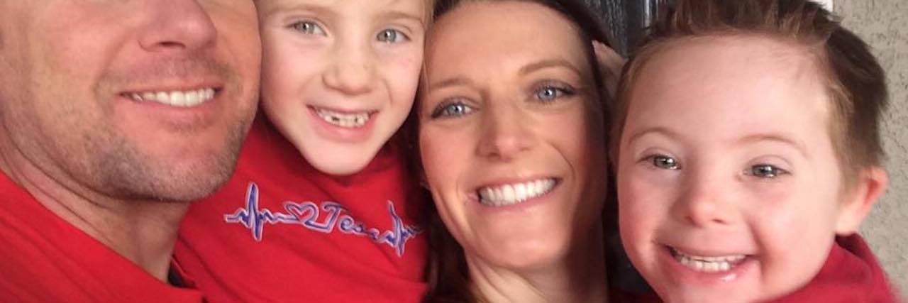 When My Son With Down Syndrome Wandered, Police and CPS Got Involved Family of 4 wearing red shirts