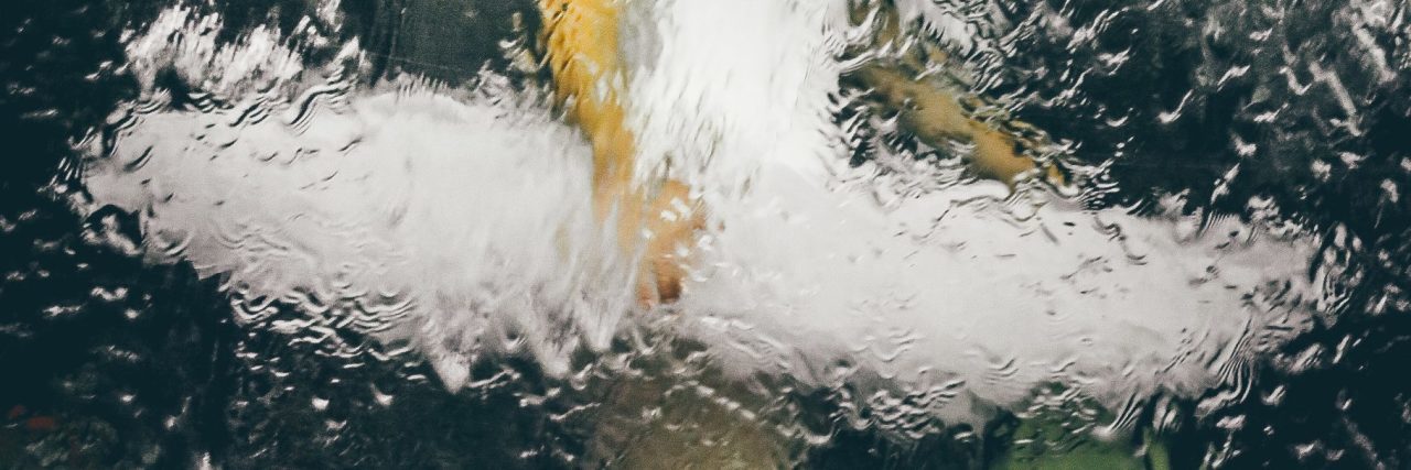 How Ballet and Body Dysmorphic Disorder Dance Together woman in ballet outfit distorted by water effect