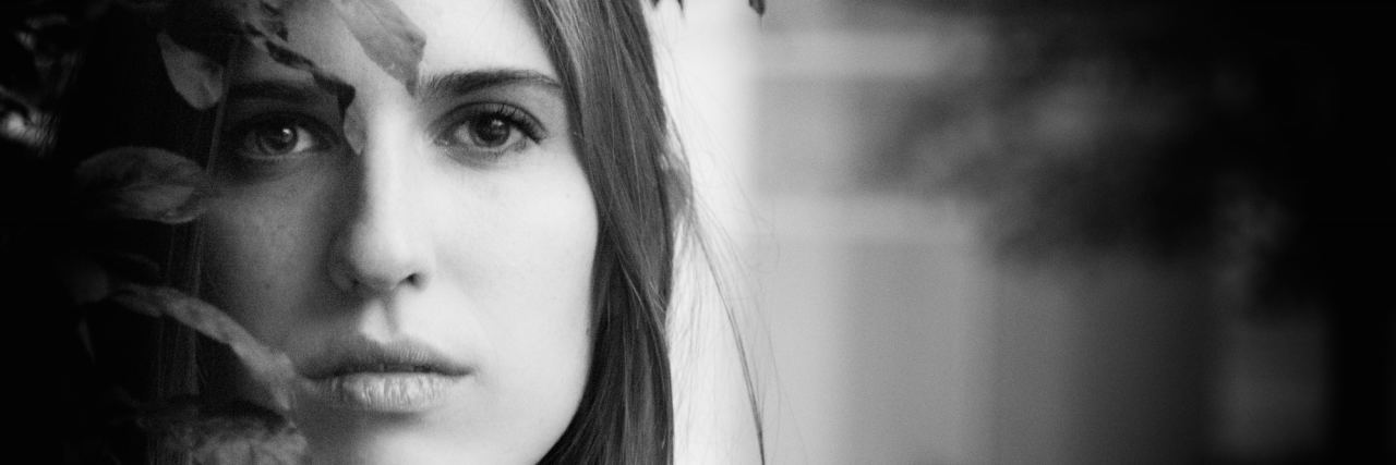 I Was Raped: Where Do I Go From Here? woman behind leaf