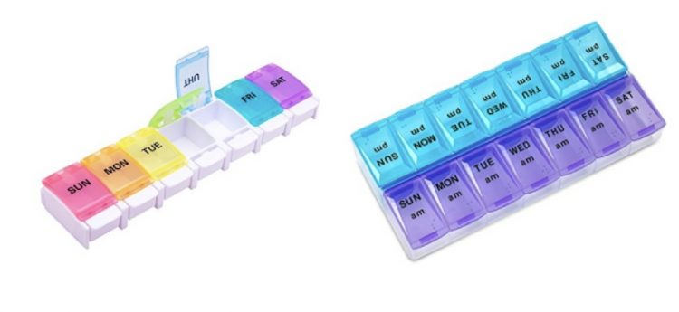 two multicolored weekly pill organizers
