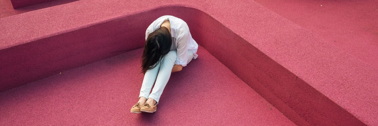 Help! I've Had an Anxiety Relapse and I Can't Get Up! woman head in hands