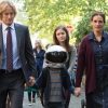 Julia Roberts and Owen Wilson holding the hand of Auggie from the film "Wonder"