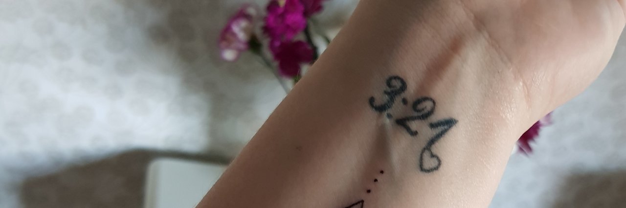 I Have Three Tattoos for Down Syndrome Awareness Images of first and second tattoo.