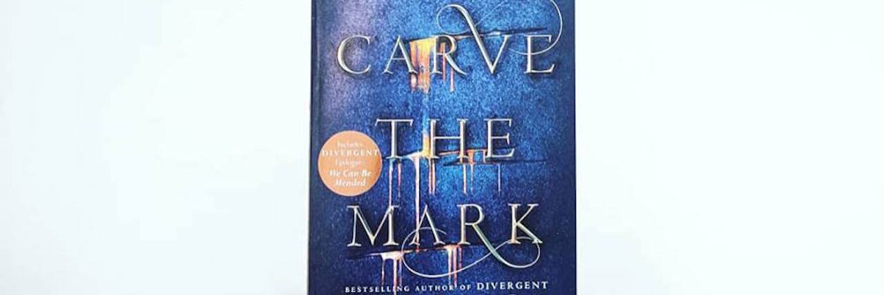 How Chronic Pain Is Portrayed in Veronica Roth's 'Carve the Mark' A photo of the book "Carve the Mark."