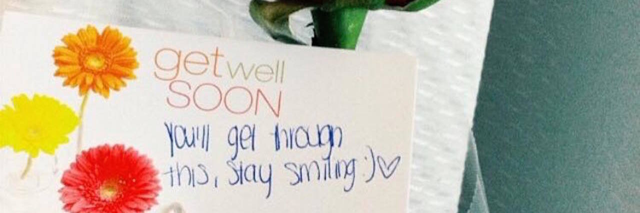 When Strangers Brought Me a Rose and Card While I Was in the Hospital rose with a card attached saying "get well soon! you got this, keep on smiling"