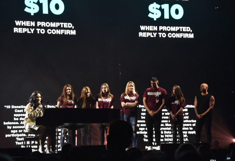 Demi Lovato on stage with Parkland shooting survivors