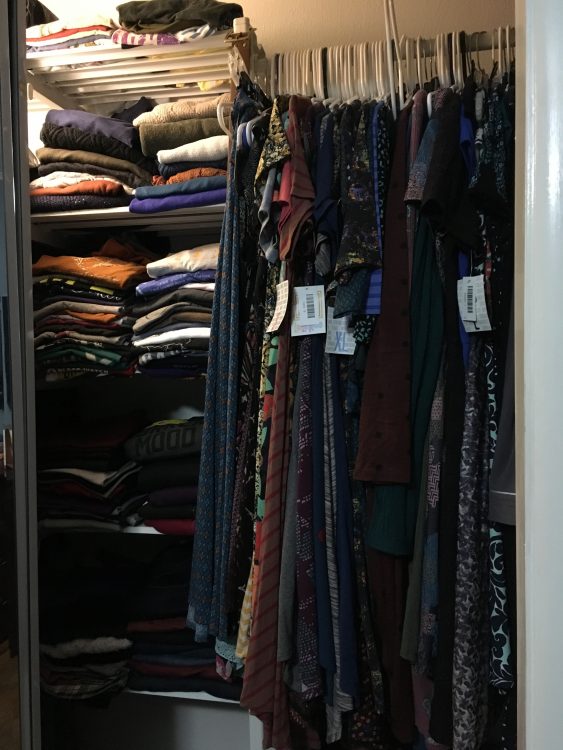 womans closet with clothing
