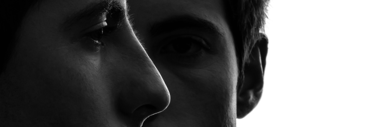 Dear America, Please Stop Blaming Mass Shooting on Mental Illness close up portrait two caucasian young men in shadow white background