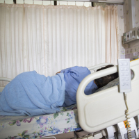 asian woman patient sleeping in hospital for recovery
