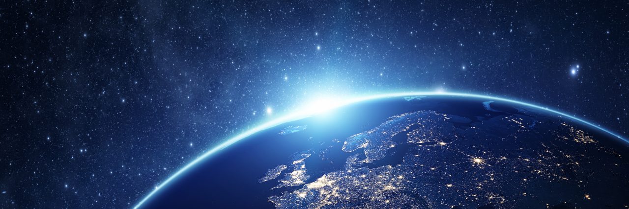 Finding Our Place in the World With a Disability Planet Earth at night.