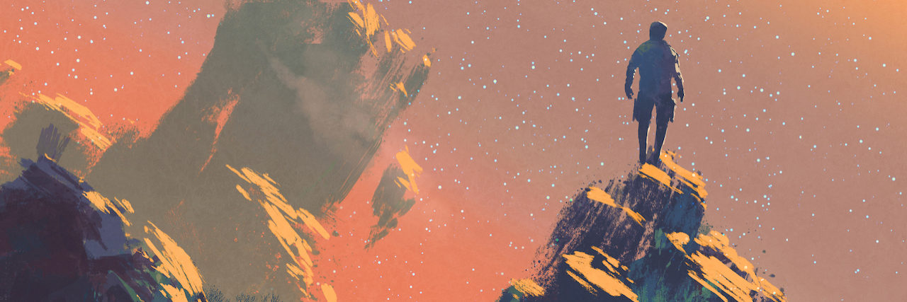 How Storytelling Helped My Son With a Mental Illness Man standing on top of mountain