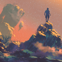 Man standing on top of mountain
