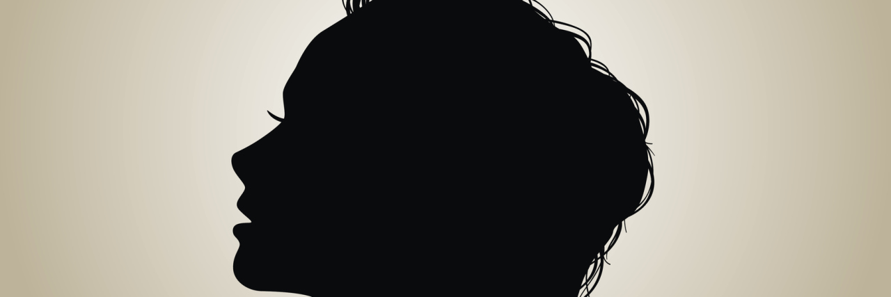 A silhouette of a woman.