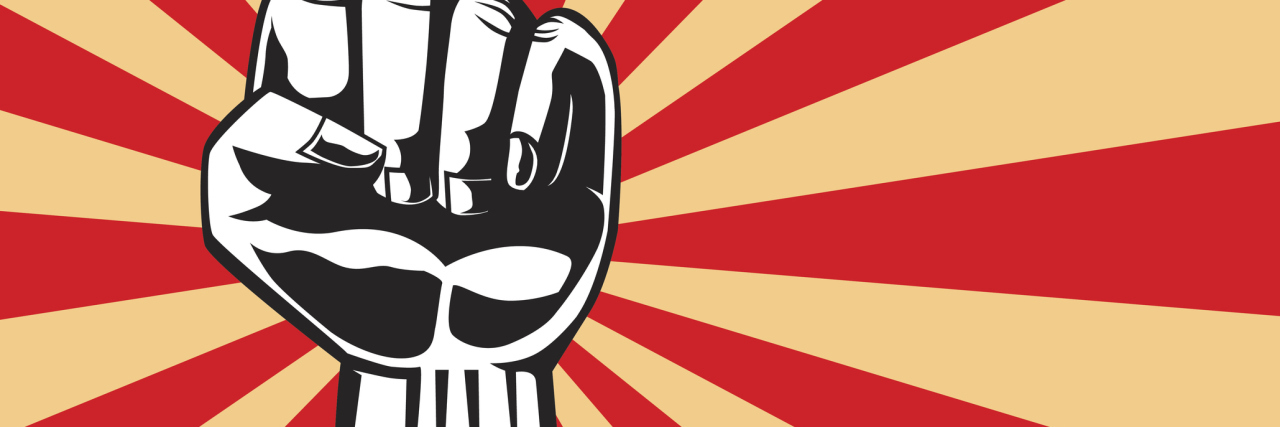 How Ehlers-Danlos Awareness Has Increased in the Past Few Years fist of revolution against striped background