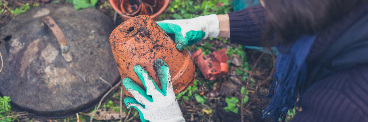 What It's Like to Have Contamination OCD A woman gardening