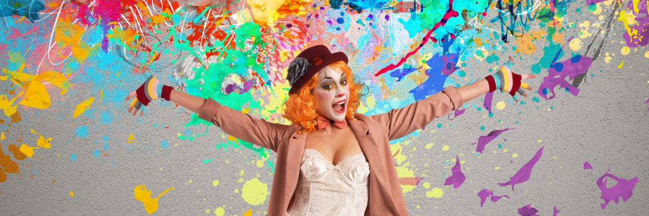 colorful photo of woman in clown makeup and paint splatters