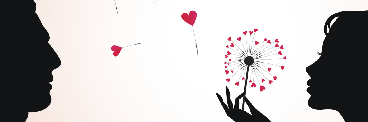 A silhouette of a woman blowing on a dandelion heart, with a silhouette of a man looking at her.