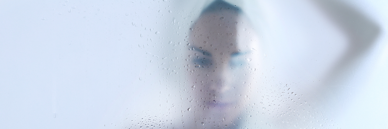 Confessions From My Shower: Coming Clean About My Grief woman crying in shower