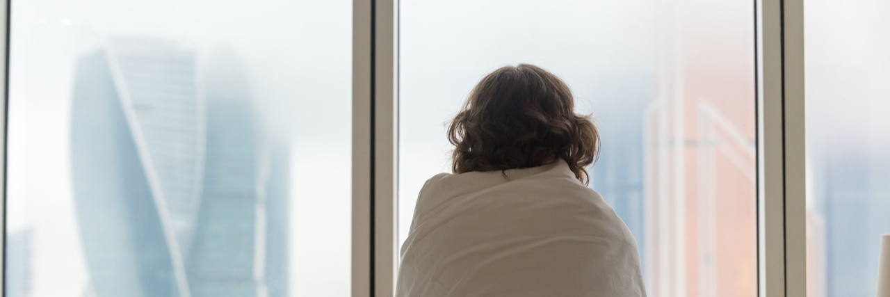 When the Medication You Take for Depression Doesn't Work A woman wrapped in a blanket
