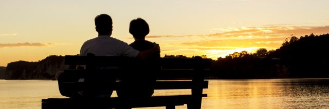 Couple watching a beautiful sunset together.