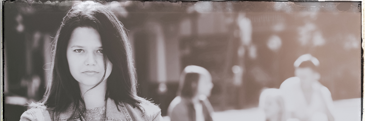 Talking Back to Bullies as a Kid With a Disability Defiant teen girl standing up to bullies.