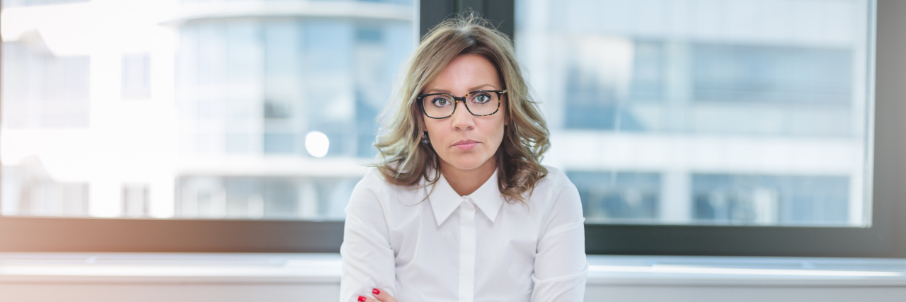 Being Diagnosed With Cancer and Going Through Chemo as a Lawyer female lawyer in a boardroom