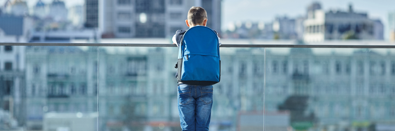 Being a Teen With Autism Boy on the street.