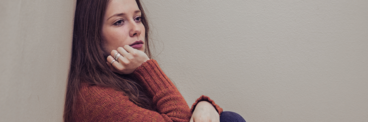Why My Depression Is Best Described as Apathy Young woman sad and depressed