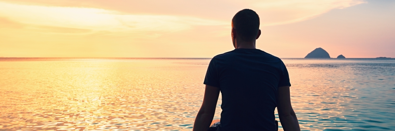 When Having Autism Feels Just Too Hard Man thinking at sunset.