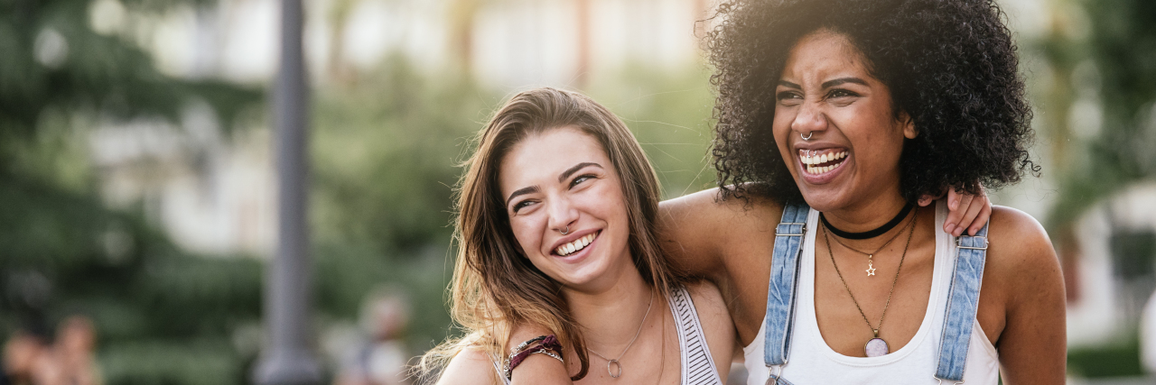 10 Simple Ways to Help a Friend With an Eating Disorder Beautiful women having fun in the street. Youth concept.