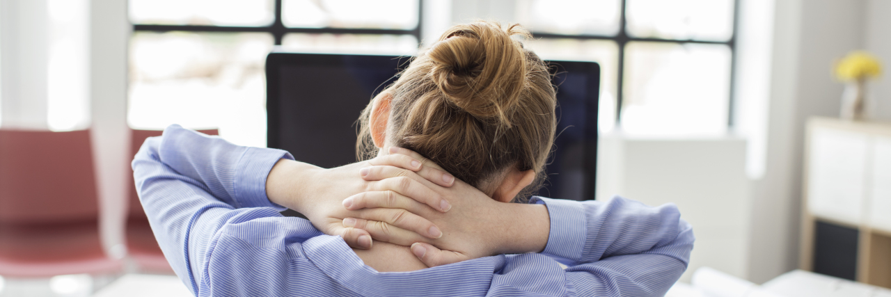 The Part of Work My OCD Affects the Most Tired businesswoman holding her nape