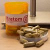 Image of actual kratom pills with a faux prescription logo.