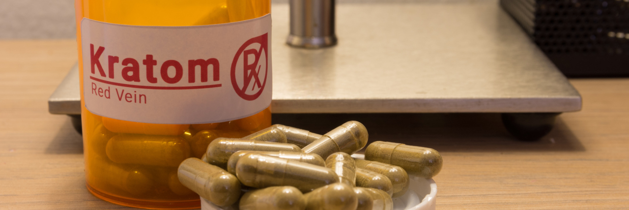 Image of actual kratom pills with a faux prescription logo.
