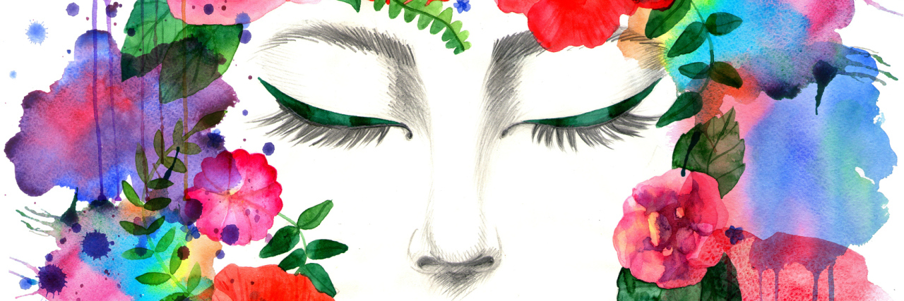 illustration of woman's face with closed eyes surrounding by a ring of colorful flowers
