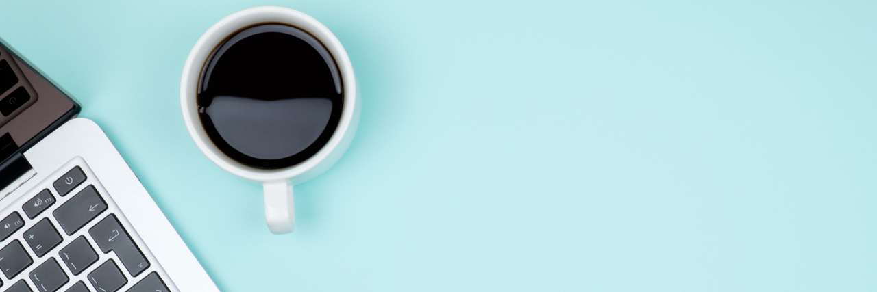 3 Things We Need to Consider About Mental Health and Social Media Colored office desk table with computer. Top view with copy space