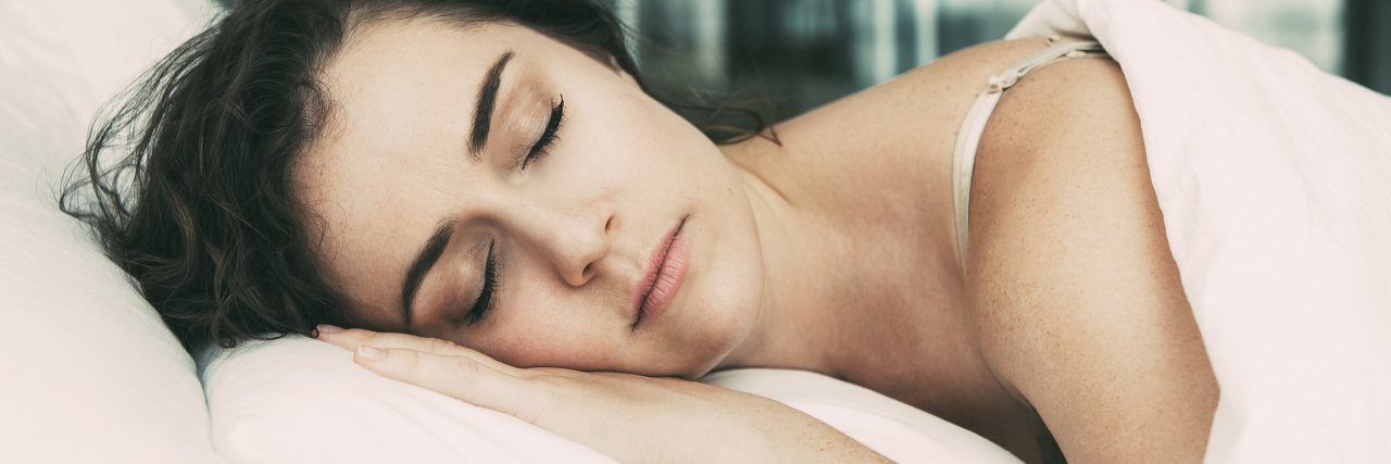 Why You Shouldn't 'Push Through' a Flare-Up woman sleeping in bed