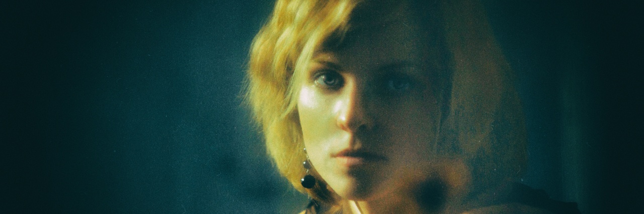 Signs Someone May Be Struggling After a Brain Injury Woman looking sad.