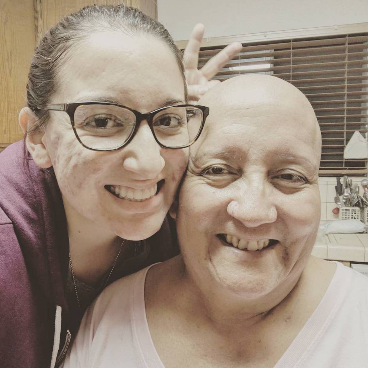 daughter and mom after shaving her head