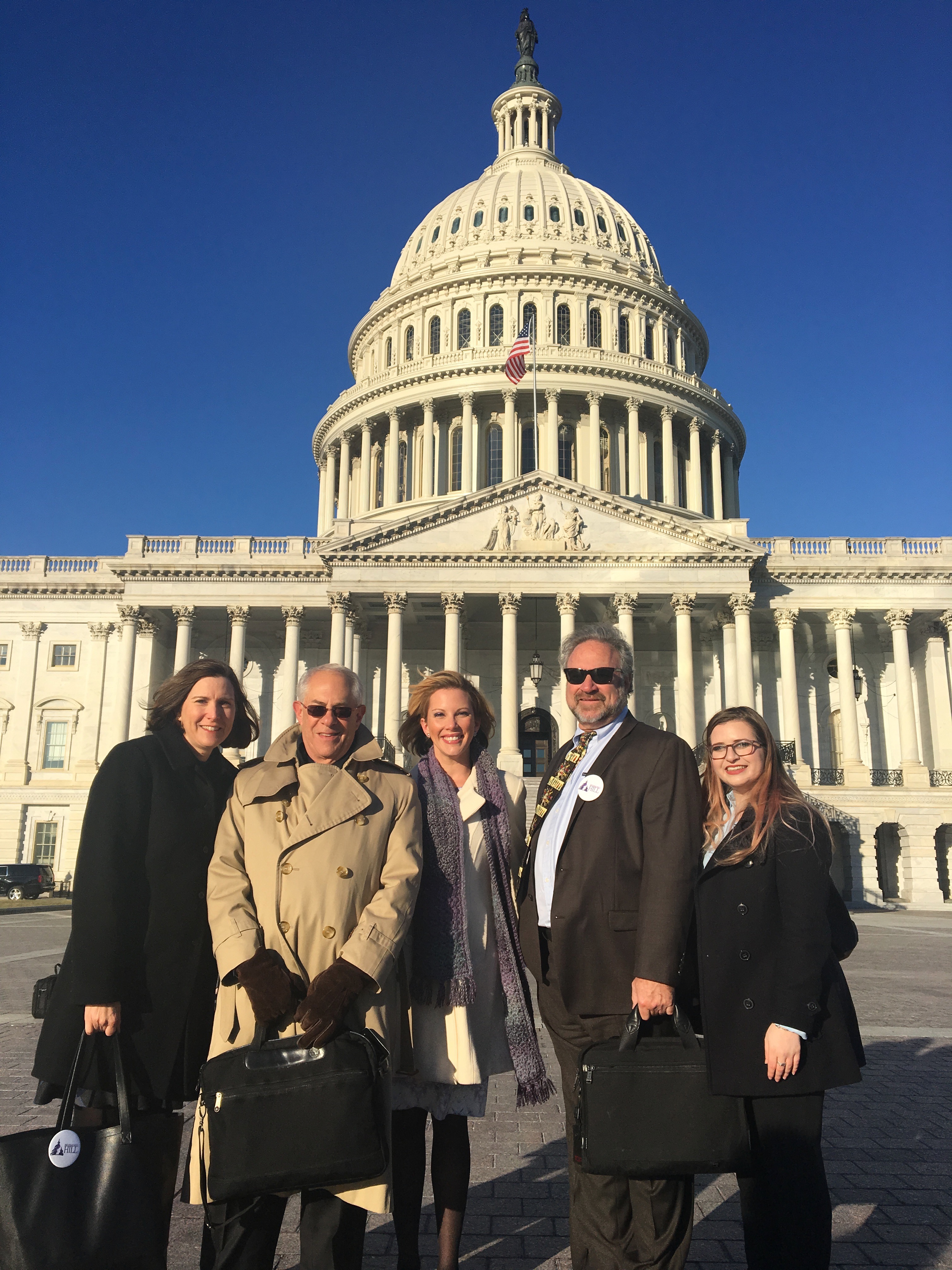 Angelica Heidi Brehm with Dr. Rapoport, Katie Golden, Dr. Cowan, and Ellie Donner-Klein in front of the U.S. Capitol.