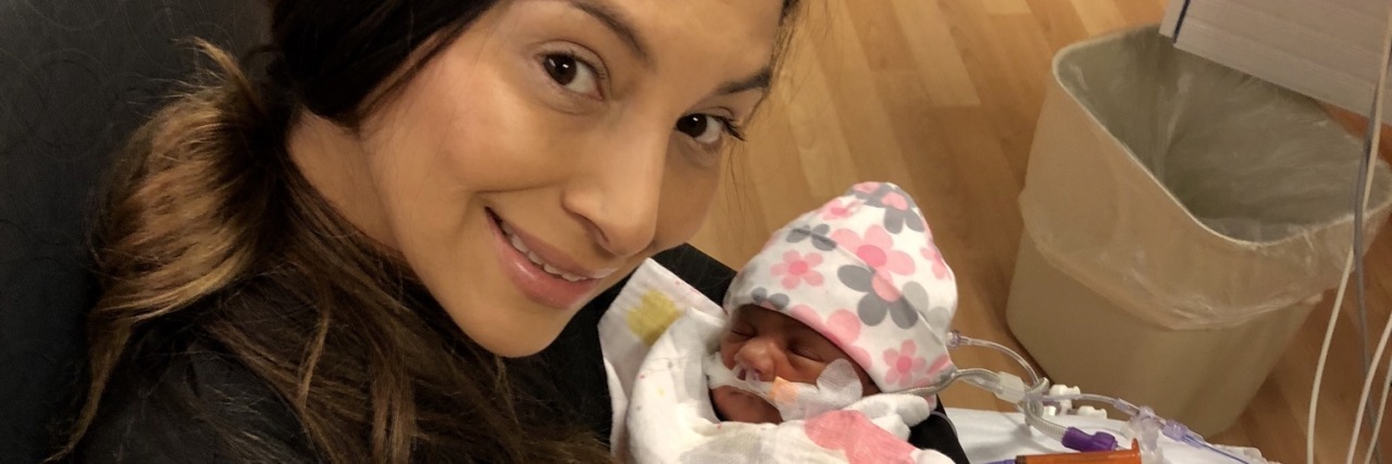 Reflections After My Baby's First Open-Heart Surgery Mother holding baby covered in wires after open-heart surgery