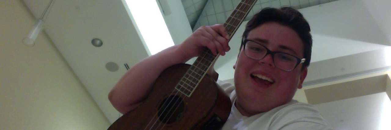 What Music Means to Me as Someone With Schizoaffective Disorder The contributor holding her ukulele