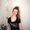 the author smiling with her IV pole