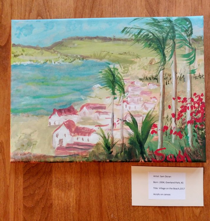 Sam Doran's painting, white houses with red roofs b a lake surounded by mountains and palm trees are closest to observer